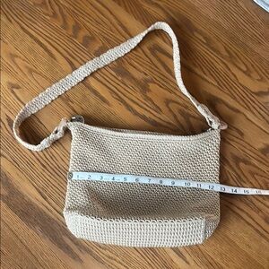 The Sak woven cream bag